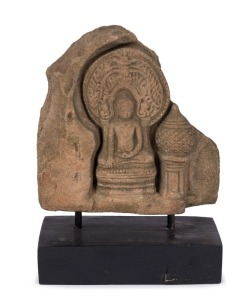 An antique North Indian Himalayan statue of a seated Buddha, carved stone, 15th/16th century, 15cm high, 20cm high overall