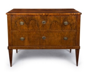 An antique French walnut commode with two drawers on tapering spade legs, 19th century, ​​​​​​​85cm high, 111cm wide, 56cm deep