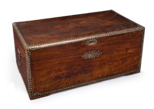 A fine Anglo-Chinese camphorwood trunk with brass studded edges, 19th century, ​​​​​​​original Chinese retailer's label inside the lid, 41cm high, 91cm wide, 49cm deep