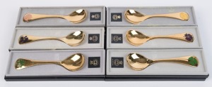 GEORG JENSEN set of six boxed Danish sterling silver year spoons with gilt finish and enamel decoration, 1974-1979, stamped "Georg Jensen, Sterling, Denmark, RA, RB", ​15cm long, 282 grams total