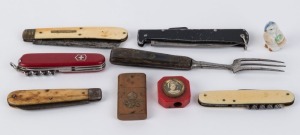 Five assorted pocketknives, an antique fork, pencil sharpener and a military cigarette lighter, (8 items), the fork 16.5cm long