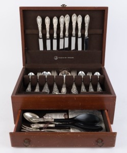 An American sterling silver cutlery service by FOWLE, 20th century, setting for eight with eight additional servers, (56 pieces total), stamped "STERLING, 1932", and housed in a branded canteen with purchasing documentation. 2,235 grams total (not includi