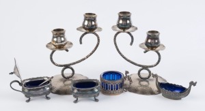 Norwegian sterling silver Viking boat condiment dish, sterling silver salt cellar, two silver plated condiment pots and a pair of silver plated two branch candelabra, 20th century, (6 items), the tallest 14cm high