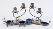 Norwegian sterling silver Viking boat condiment dish, sterling silver salt cellar, two silver plated condiment pots and a pair of silver plated two branch candelabra, 20th century, (6 items), ​the tallest 14cm high