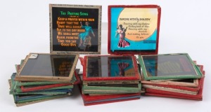 PARTY SONGS - Group of 32 vintage coloured glass plate slides, early to mid 20th century.