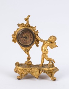 An antique table clock with fairy figured gilt metal case, late 19th century, ​22cm high