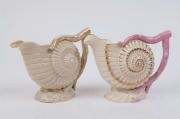 BELLEEK two antique Irish porcelain shell jugs, 19th century, early black factory mark to bases, 14cm high