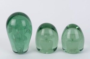 Three antique English glass dumps with floral inclusions, 19th century, 12cm, 9cm and 8.5cm high