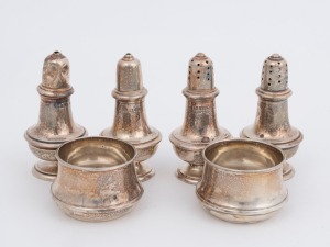 Six piece sterling silver condiment set, early 20th century, ​the largest 7cm high, 116 grams total