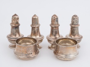 Six piece sterling silver condiment set, early 20th century, the largest 7cm high, 116 grams total