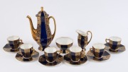 ROYAL DOULTON 15 piece English porcelain blue and gilt coffee set, circa 1935, green factory mark to base, the coffee pot 22cm high
