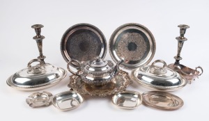 A pair of silver plated tureens, pair of candlesticks, three assorted trays, a teapot, sauceboat and assorted dishes, 19th and 20th century, (12 items), the candlesticks 25cm high.