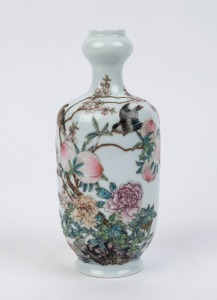 A Chinese porcelain vase with enamel decoration of birds, fruit and blossoms, 20th century, 20.5cm high