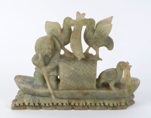 A Chinese carved jade fisherman ornament, 19th/20th century, 21cm high, 27cm wide