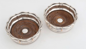 A pair of antique Old Sheffield Plate wine bottle coasters, 19th century, 5.5cm high, 15cm wide