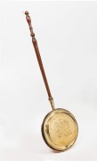 A Georgian bed warming pan, copper and brass with fruitwood handle, early 19th century, ​117cm long