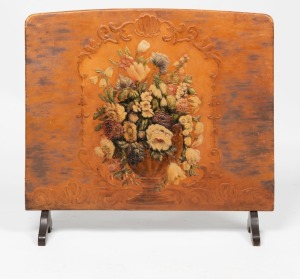 An embossed leather decorated fire screen, early 20th century, ​69cm high, 73cm wide