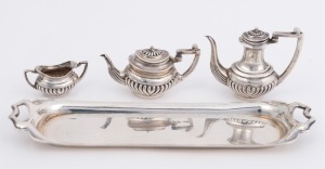 A sterling silver miniature tea service and tray, (4 items), the tray 14cm wide, 62 grams total