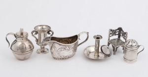 Six assorted sterling silver miniature items including cream jug, chamber stick, milk can, pepper pot, trophy and corner chair, the trophy cup 4cm high, 72 grams total