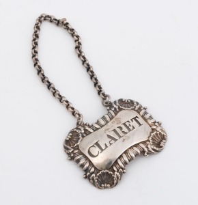 A Georgian sterling silver "CLARET" decanter label by William Eaton of London, circa 1815, 5cm wide