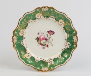 ROCKINGHAM antique English porcelain cabinet plate with hand-painted floral spray, green border and gilded highlights, circa 1830, 22.5cm wide