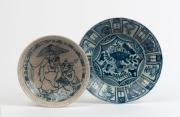 A Ming style Chinese blue and white porcelain bowl decorated with lotus, fish and sunflowers; together with a Chinese blue and white bowl with crackle glaze, Qing Dynasty, 19th century, (2 items), 25cm and 20cm diameter