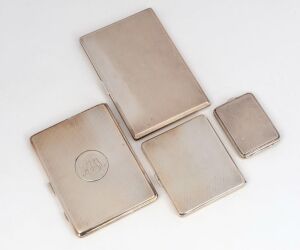 Four assorted sterling silver cigarette and card cases, early 20th century, 528 grams total