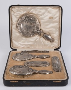 An English sterling silver vanity set in original case, made in Birmingham, circa 1916, ​the case 35cm wide