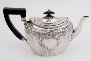 An English sterling silver teapot by James Dixon & Sons, Sheffield, circa 1899, ​​​​​​​13cm high, 23cm wide, 376 grams total