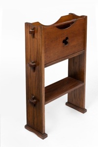 An English oak Arts & Crafts bookstand journal rack by "W.A. Rathbone Clyde Street Liverpool", circa 1900, ​​​​​​​68cm high, 47cm wide, 15cm deep