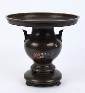 A Japanese bronze ikebana pot made in three sections inlaid with silver and copper, Meiji period, late 19th century, ​​​​​​​29.5cm high, 30.5cm diameter