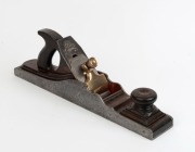 An 18¼" panel plane, user made cast steel with rosewood infill, 19th century, 