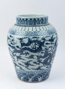 A Ming style blue and white Chinese porcelain vase with dragon decoration, 20th century, ​​​​​​​unglazed base, 42cm high