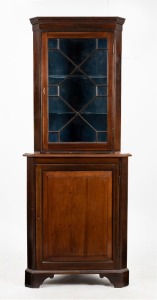 A Georgian style antique English mahogany corner cabinet with blue velvet interior, late 19th century, 199cm high, 81cm wide, 50cm deep