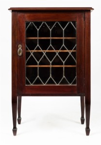 An Australian blackwood music cabinet with leadlight door, early 20th century, 101cm high, 66cm wide, 46cm deep