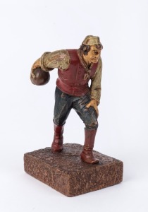 An Austrian Cold painted cast metal statue of a bowler, early 20th century, 18cm high