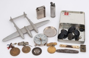 Buttons, medals, plane ornament, pocket compass, lighters and oddments, 20th century, (qty)