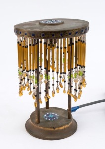 A Bohemian cabaret table lamp, beaten brass, glass and enamel, early 20th century, ​​​​​​​26cm high