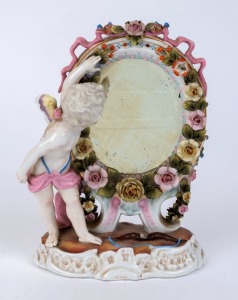 An antique German porcelain figural table mirror, 19th century, 21cm high