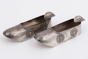 A pair of Chinese silver shoe ashtrays, early 20th century, ​​​​​​​11.5cm long, 102 grams