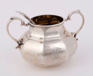 An English sterling silver sugar bowl made in London, circa 1879; together with a Georgian sterling silver teaspoon, (2 items), 9cm high, 14cm wide, 212 grams total
