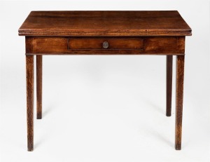 A Georgian fold-over oak tea table with single drawer, circa 1790, 72cm high, 96cm wide, 45cm deep