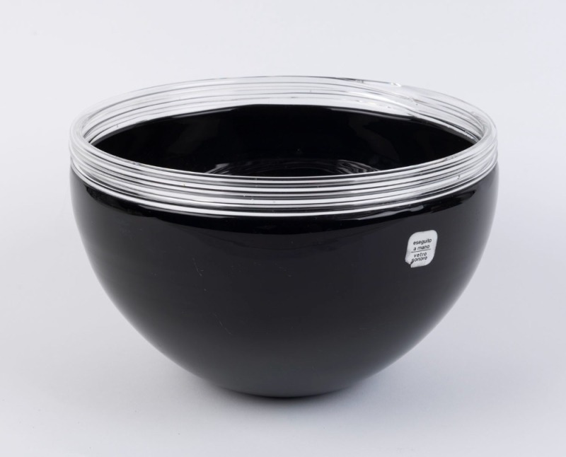 ALFREDO BARBINI black Murano glass ice bowl with applied clear glass rim, incised "Barbini, Murano" with original label "Eseguito a Mano, Vetro Sonoro", 16cm high, 25cm diameter