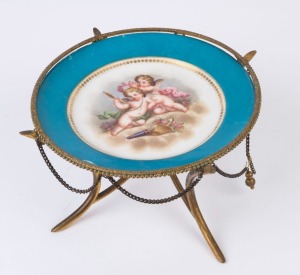 A Continental porcelain tazza with gilt metal mounts, 19th century, 13cm high, 27cm wide