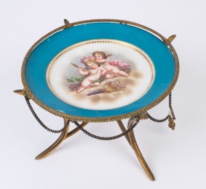 A Continental porcelain tazza with gilt metal mounts, 19th century, ​​​​​​​13cm high, 27cm wide