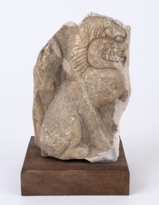 An antique Chinese architectural foo dog fragment, carved marble, 17th century or earlier, 24cm high overall