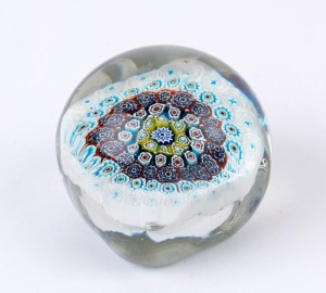 An antique millefiori glass paperweight of squarish form, 19th century, 8cm high