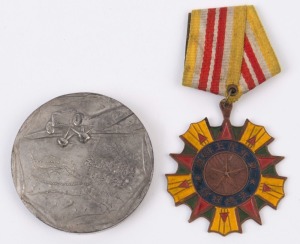 MEDALS - CHINA: 1947 North East Democratic Allied Army field medal with ribbon; also a replica medallion of a WWII Japanese war medal. (2 items)