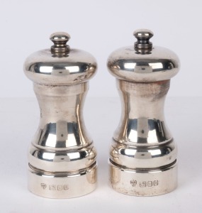 A pair of English sterling silver pepper grinders, London, 20th century, 10cm high