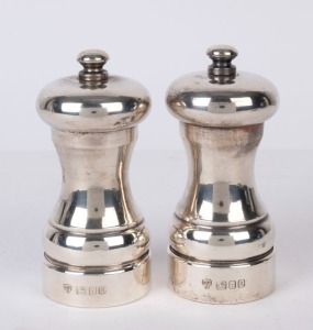 A pair of English sterling silver pepper grinders, London, 20th century, ​​​​​​​10cm high